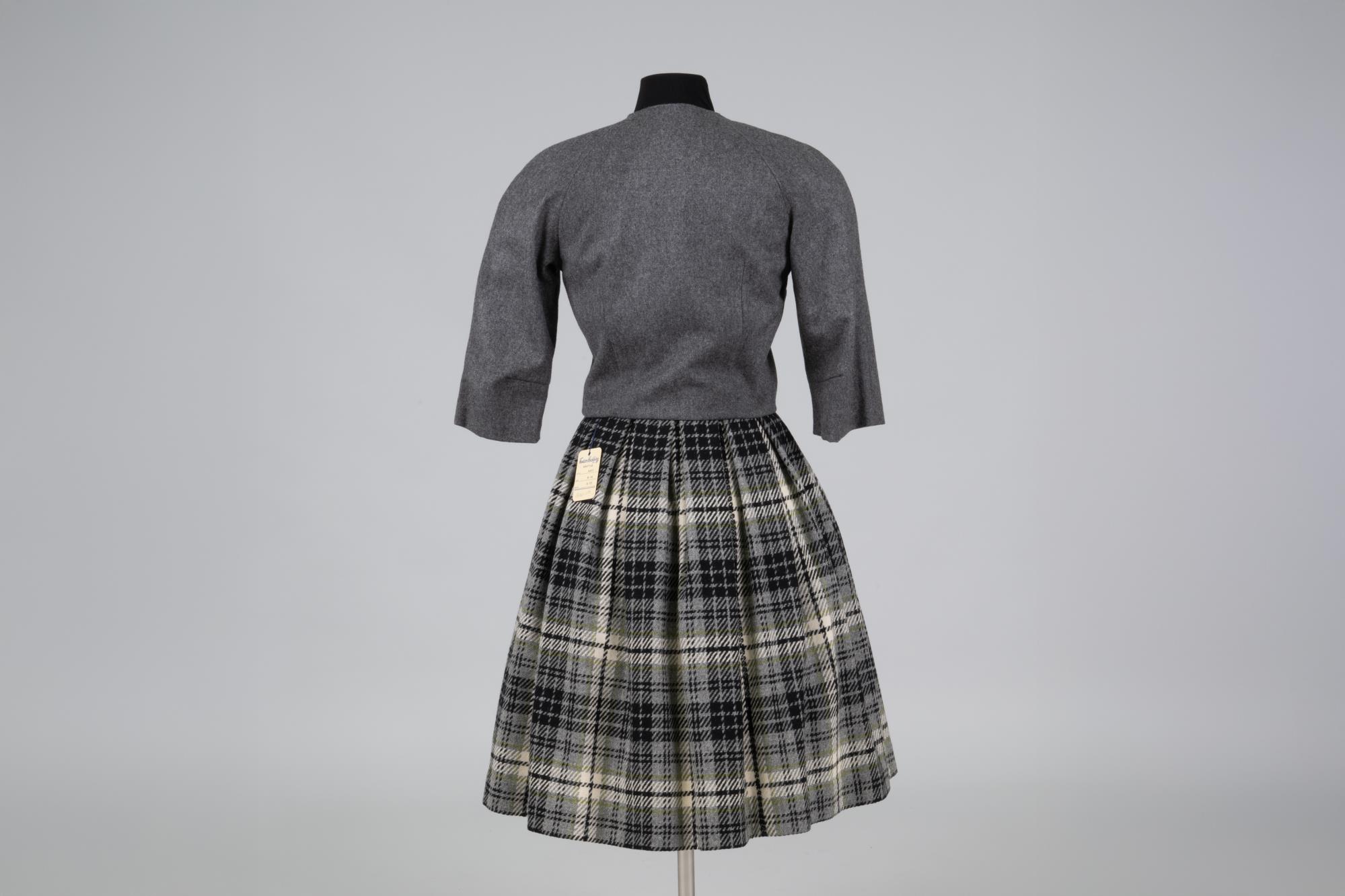 Image of Sailmates jacket and skirt ensemble, modeled in the World's Fair Fashion Pavilion, 1962